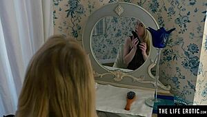 Hey, wanna see this horny blonde in fishnets ride a huge black dildo?