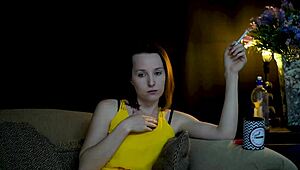 Sucking on a Cigarette While Staring at You. This Brunette Knows How to Tease.