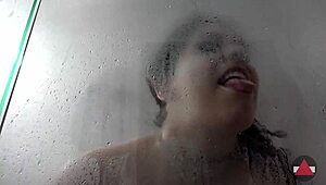 brunette dries off nude in messy bathroom