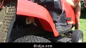 Old man licks and fucks young blonde in missionary on lawnmower