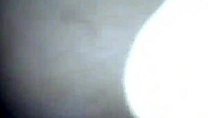 Blue film with a reverse shot of a dick and ass