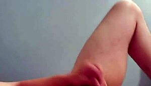 young guy fiddles with his watch and displays his rear