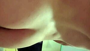 young guy fiddles with his watch and displays his rear