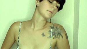 big tits brunette babe shows off while cleaning house downblouse