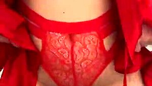 brunette feels pleasure in red lingerie touching her big tits