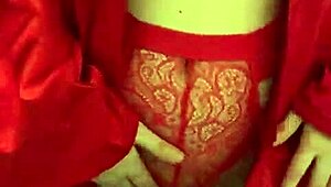 brunette feels pleasure in red lingerie touching her big tits