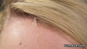 Hot looker receives bukkake cumshot on face