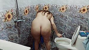 real indian stepsister caught pissing and touching herself in bathroom