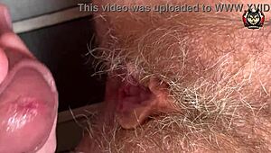 Hairy pussy gets pounded in ultra-closeup action during intimate session.