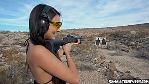 Showing off her cute tits at the shooting spot