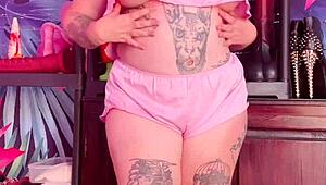 Teasing in Silk Pajamas with Smooth, Captivating Moves.