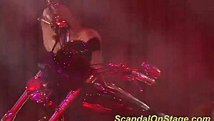 uhh, busty milf on stage strippin’ down, makin’ me crazy with them big ones, ya know?