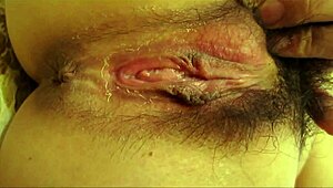 Chinese busty model shows wet pussy up close