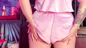 Teasing in Silk Pajamas with Smooth, Captivating Moves.