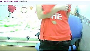 Asian Amateur Engages in Solo Masturbation Session