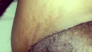 Playing with that tight pussy in a close-up black cock handjob.