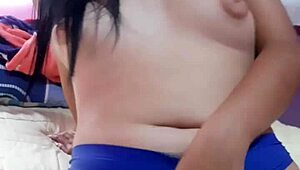 Young girl complains and screams while touching her body.