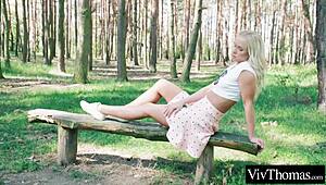 sexy blonde kisses hot brunette in forest, then they lick indoors