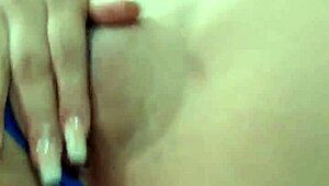 Young girl complains and screams while touching her body.