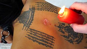 Asian girlfriend enjoys hot wax play and rough spanking