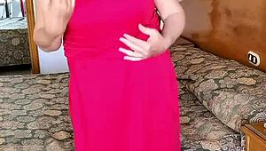 Hot milf teases huge tits and shaved pussy in red stockings