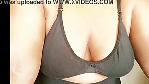 the sexy girl plays with her big tits in this story