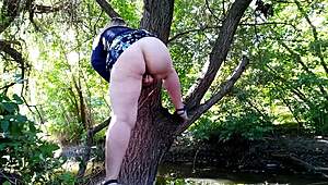 horny milf fingers outdoors suggestively