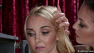 look at this blonde lesbian slave getting her ass toyed by her domme best friend in bondage.