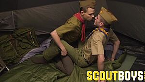 Austin and Oliver, scout twinks, engage in bareback tent sex, leading to cum