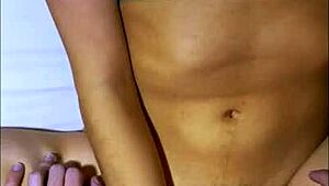 Shy university friend shares bed after party, leading to cheating orgasm!