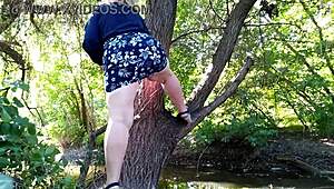 horny milf fingers outdoors suggestively