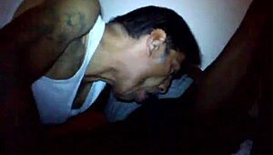 Cpdcr3 sucks on a big black cock, focusing on the monster cock in gay sucking scene