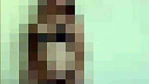 Femdom ballbusting scene with a male submissive