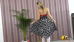 katerina hartlova dresses up in pinup costume, showing off her big tits and pussy while playing with her feet in stockings.