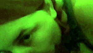 Redhead MILF giving blowjob to voyeur with music