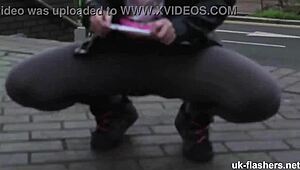 meowing for attention in outdoor public setting