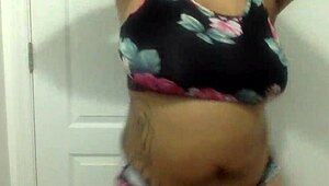 Big tit ebony milf dances in the bathroom