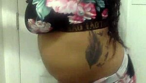 Big tit ebony milf dances in the bathroom