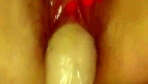 she fingers her wet pussy while i stuff her with gigantic dildo!