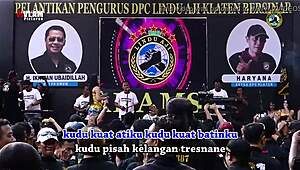 indonesian singers perform wild erotic dance on stage with eager crowd