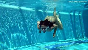 Tiny Russian teen Jessica Lincoln goes swimming in the pool