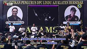 indonesian singers perform wild erotic dance on stage with eager crowd