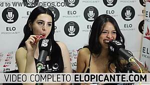 Bisexual lesbians kissing and playing with lollipop