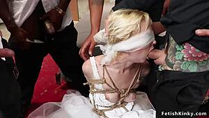 Blindfolded tied bride taken by a wild group