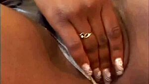 Ebony women getting fucked with big black cocks on the couch, their big tits bouncing everywhere.