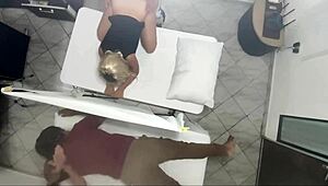 so, this real video shows a masseur banging a wife next to her husband