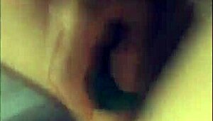 she inserts big cucumber into her cunt using toys