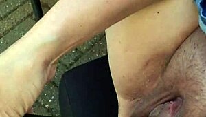 Asian mature wife rubs her tight pussy outside in wild Danish solo action.