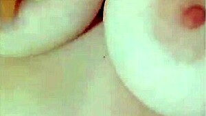 Young maid flaunts big tits in close-up video for boss raise