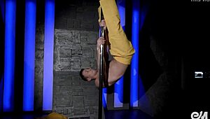 hot young gay guy performs acrobatic strip tease, ripping clothes while dancing on the pole